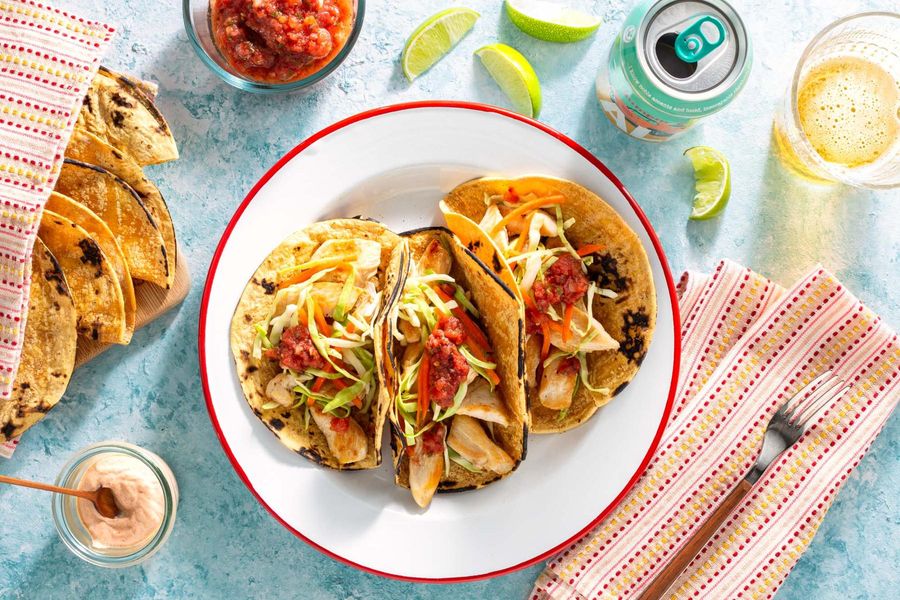Tacos with cabbage slaw, salsa roja, and chipotle yogurt