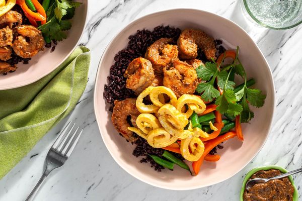 Tamarind chicken over black rice with bell pepper and egg ribbons