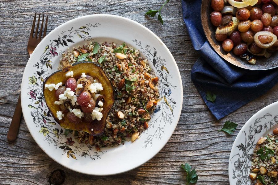 Roasted acorn squash with grapes, goat cheese, and quinoa image