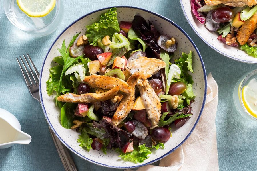 Waldorf chicken salad with walnuts, grapes, and peach slices