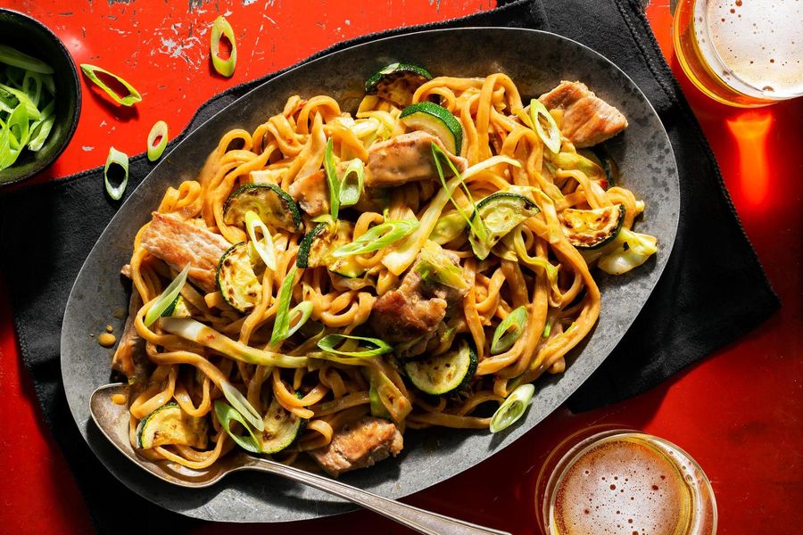 Malaysian pork mee goreng with udon noodles and zucchini