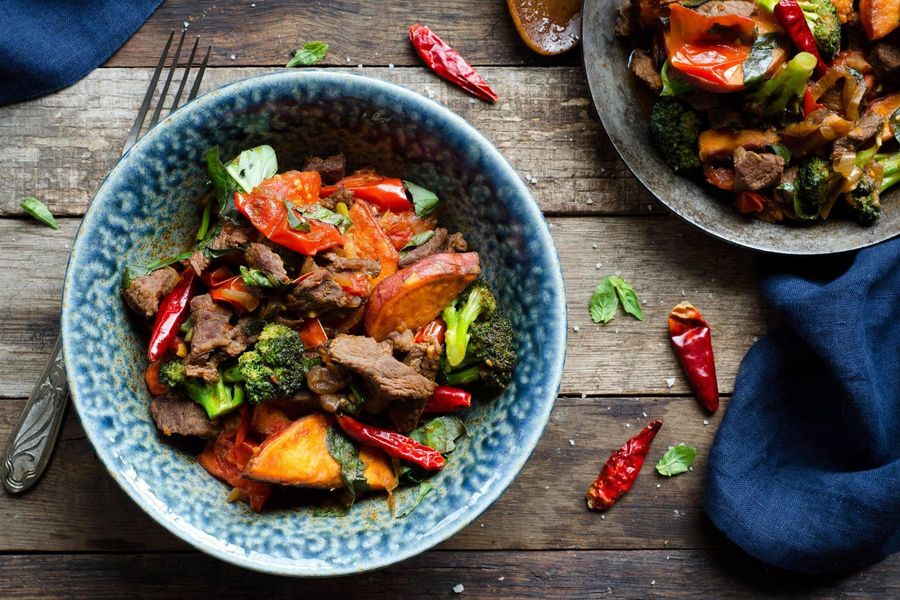 Stir-fried beef with tomato, basil, and sweet potatoes