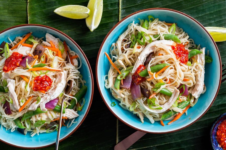 Pancit bihon noodle stirfry with chicken and vegetables