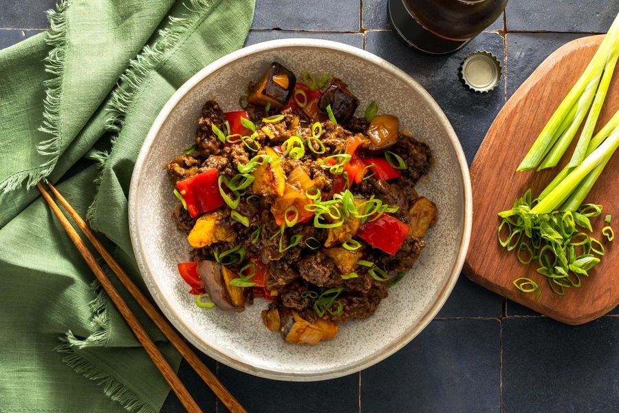 Five-spice stir-fry with eggplant and cashew-plum sauce