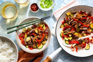 Hanoi steak stir-fry with zucchini and bell pepper over steamed rice