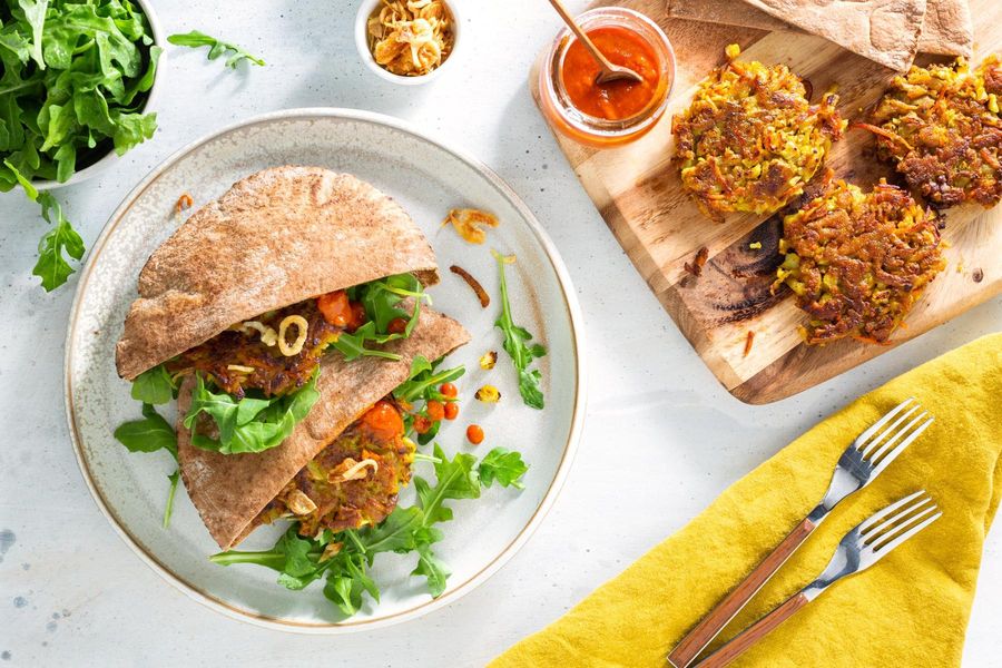 Pitas with potato-cauliflower fritters and spicy chile-mango sauce