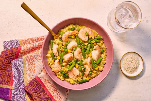 Spinach risotto with shrimp and summer vegetables