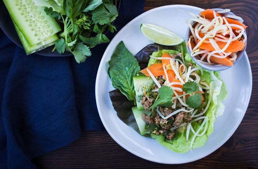 Steak lettuce wraps with fresh herbs and bean sprouts