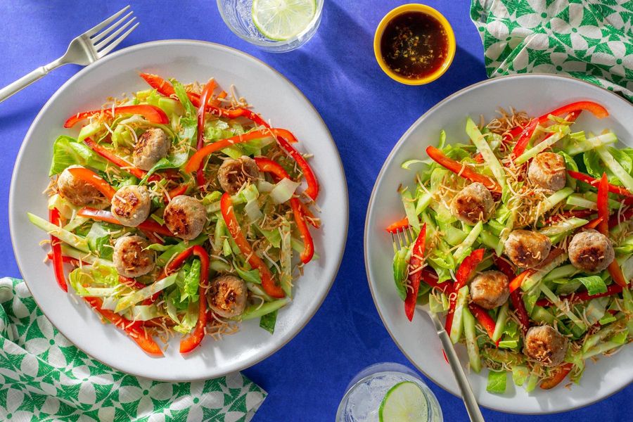 Coconut-lime meatballs with Thai cucumber and bell pepper salad