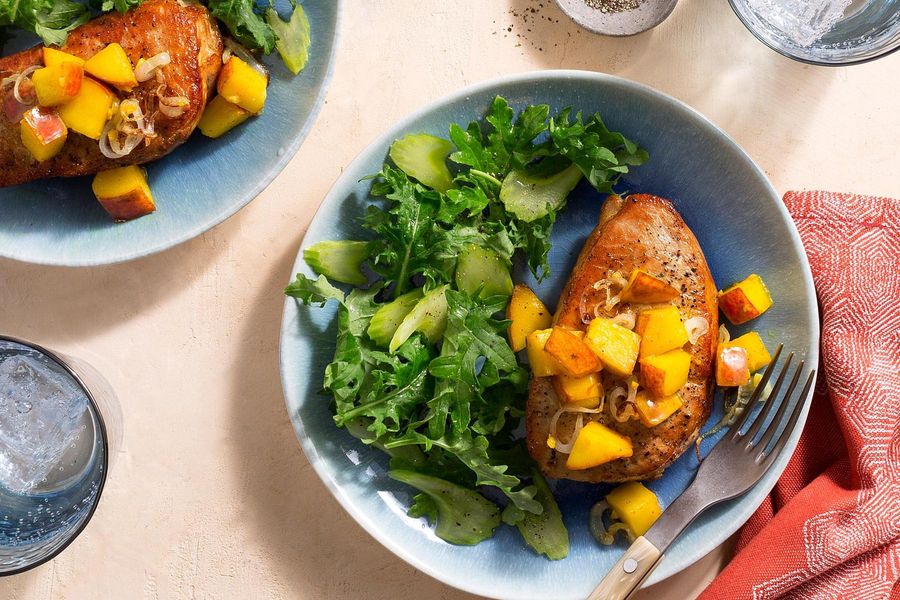 Pork chops with ginger-nectarine pan sauce and kale salad