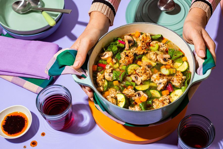 Hearty turkey soup with zucchini, rainbow chard, and Urfa chile oil