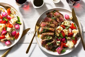 Seared steaks with bagna càuda, cauliflower, and radishes