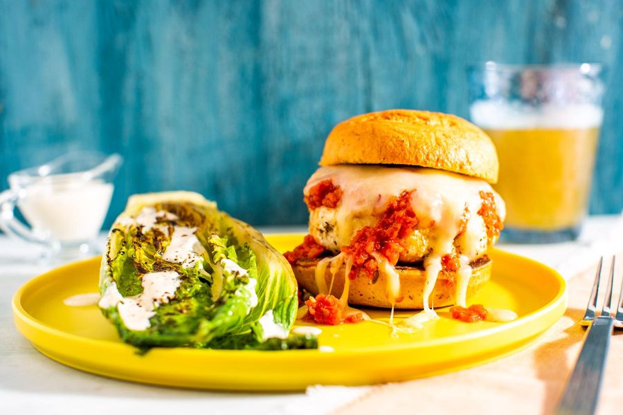 Chicken and mozzarella burgers with seared Caesar salad