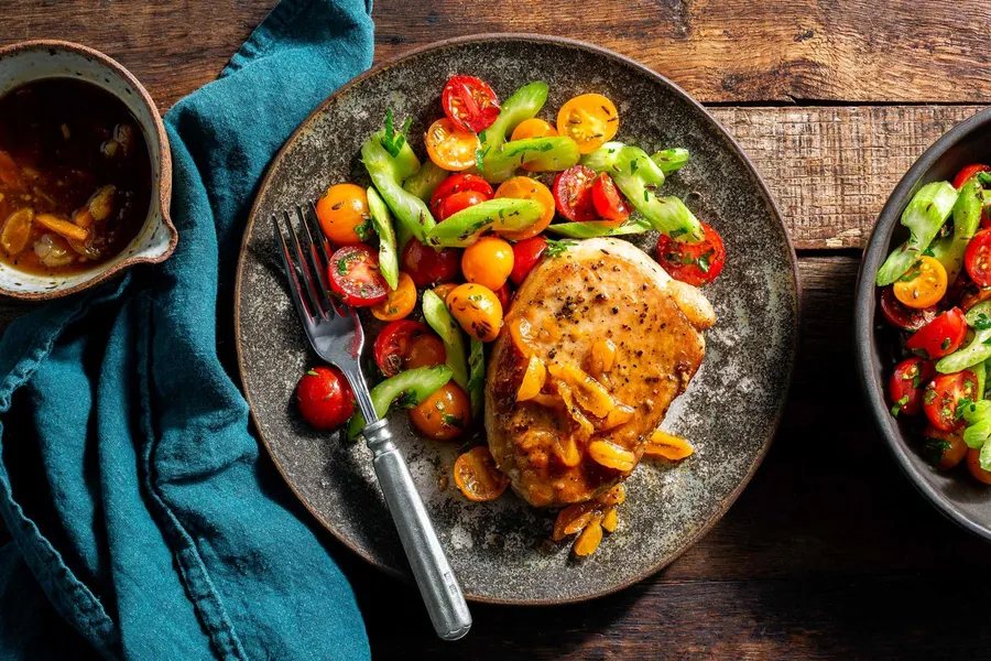 Pork chops with apricot mostarda and tomato-celery salad