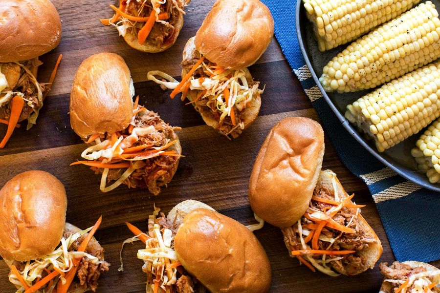 Pulled pork sliders with coleslaw and corn on the cob