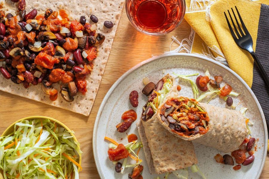 Two-bean sloppy joe wraps with mushrooms and tangy coleslaw