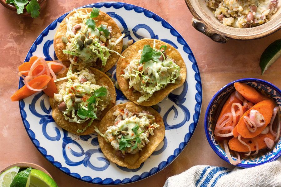 Tex-Mex tostadas with pickled carrots and avocado crema