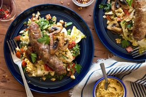 Chicken sausages with warm cauliflower salad and artichoke romesco