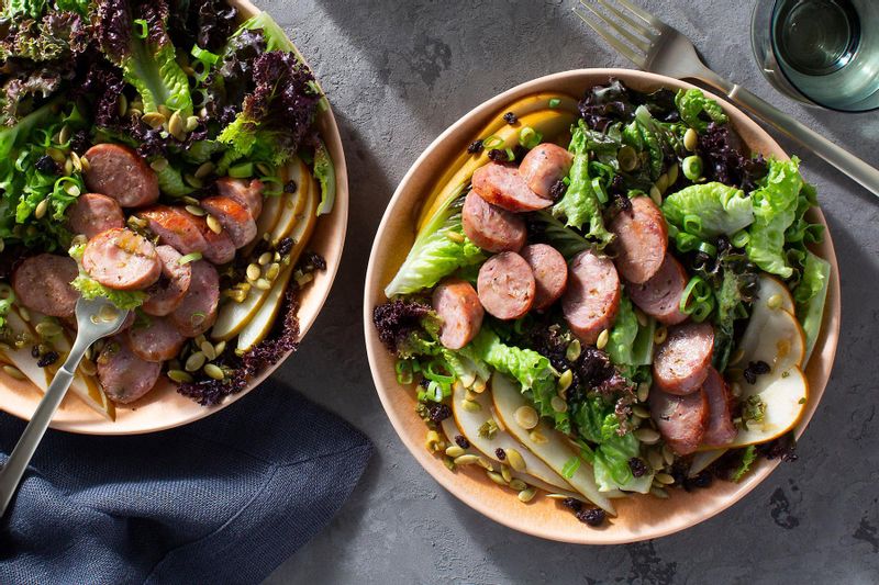 Sausage and Pear Salad with Pumpkin Seeds and Warm Sage Vinaigrette