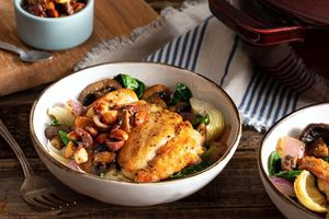 Braised chicken with mushrooms, artichokes, and almond-olive relish