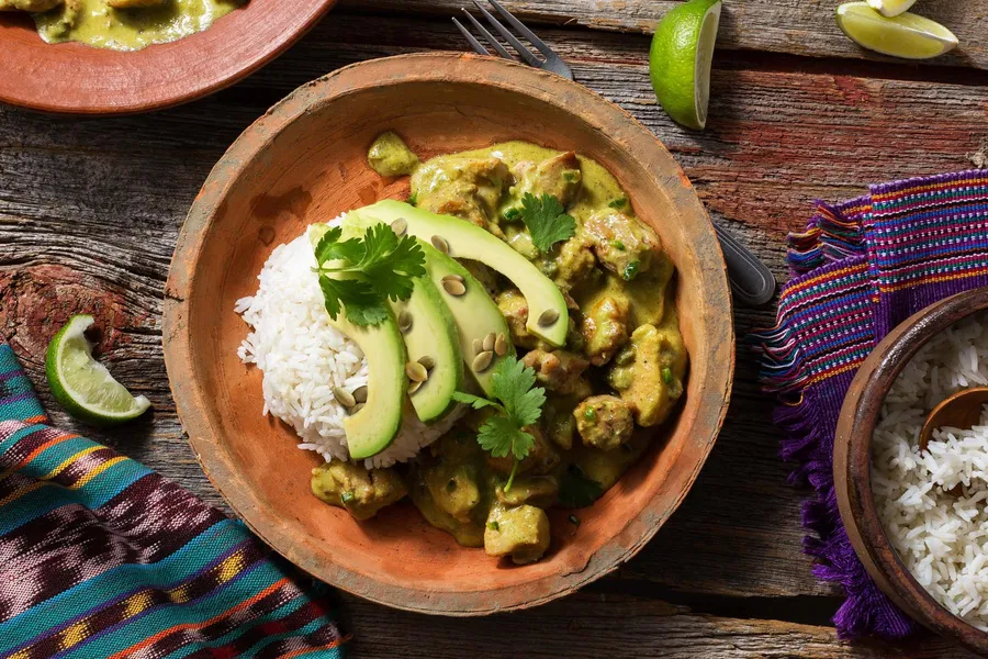 Guatemalan jocón de pollo with tomatillo sauce over white rice