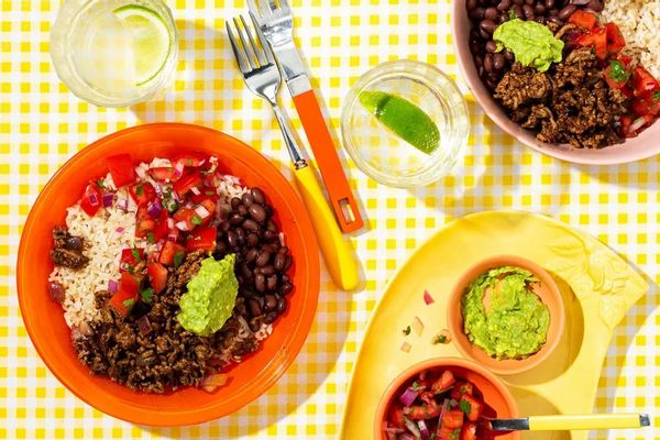 Turkey taco bowls with brown rice, black beans, and pico de gallo