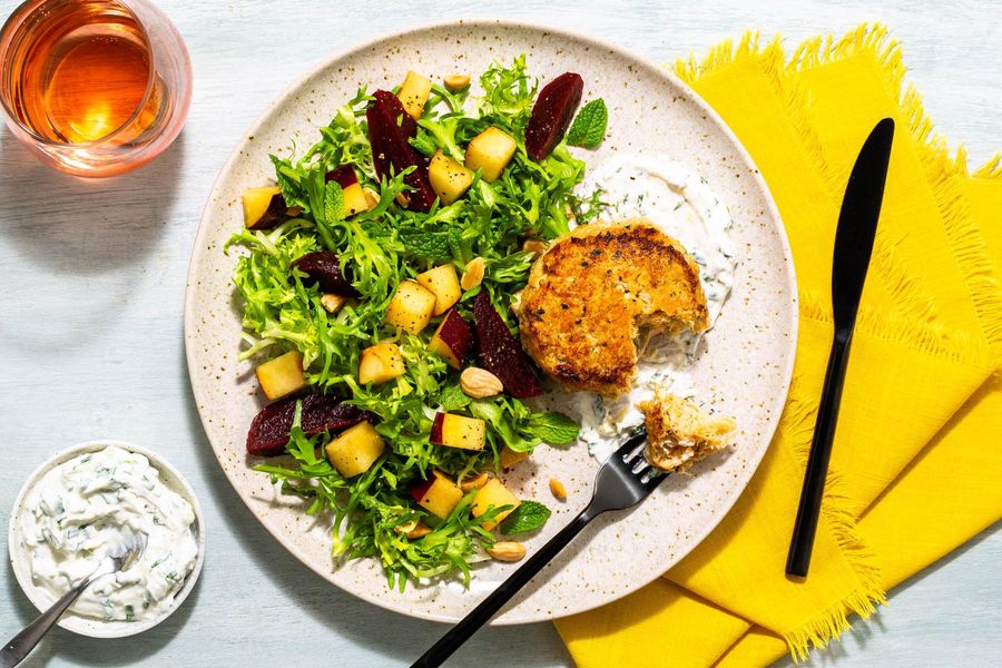 Crab cakes with herbed lemon yogurt and warm beet–plum salad