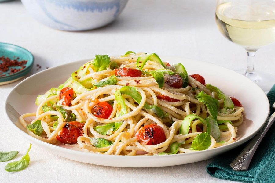 Spaghetti “Alfredo” with shaved asparagus and charred tomatoes