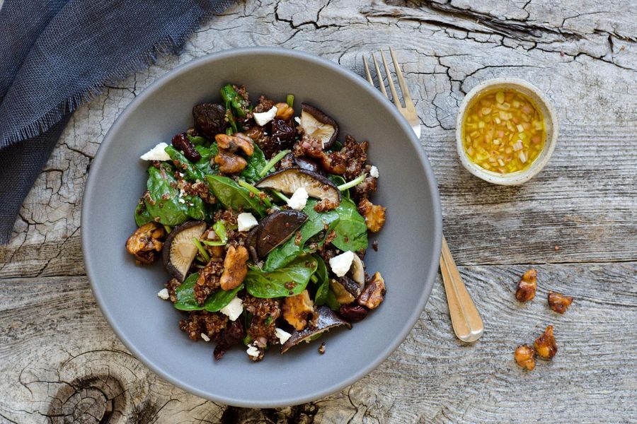 Warm quinoa salad with sour cherries and shiitakes