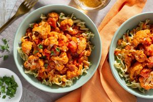 Cauliflower paprikash with roasted red peppers over egg noodles