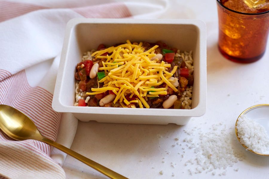 Three bean chili with brown rice and cheddar cheese