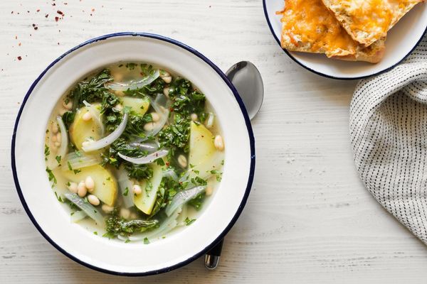 Kale, white bean, and potato soup with cheese toasts