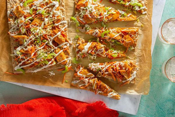Buffalo chicken flatbreads with celery-carrot salad and ranch dressing