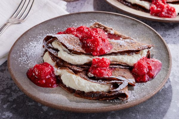 Chocolate Crêpes with Whipped Ricotta Cheese & Raspberry Sauce