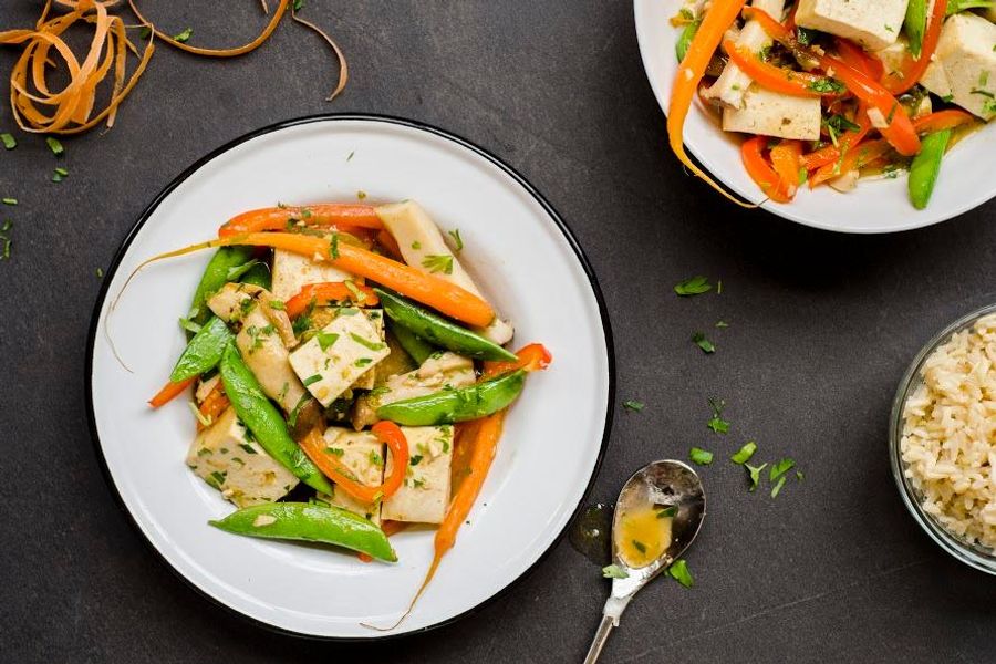 Tofu and spring vegetables with green curry and brown rice