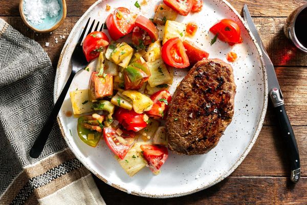 Palermo steaks with warm fennel and tomato salad